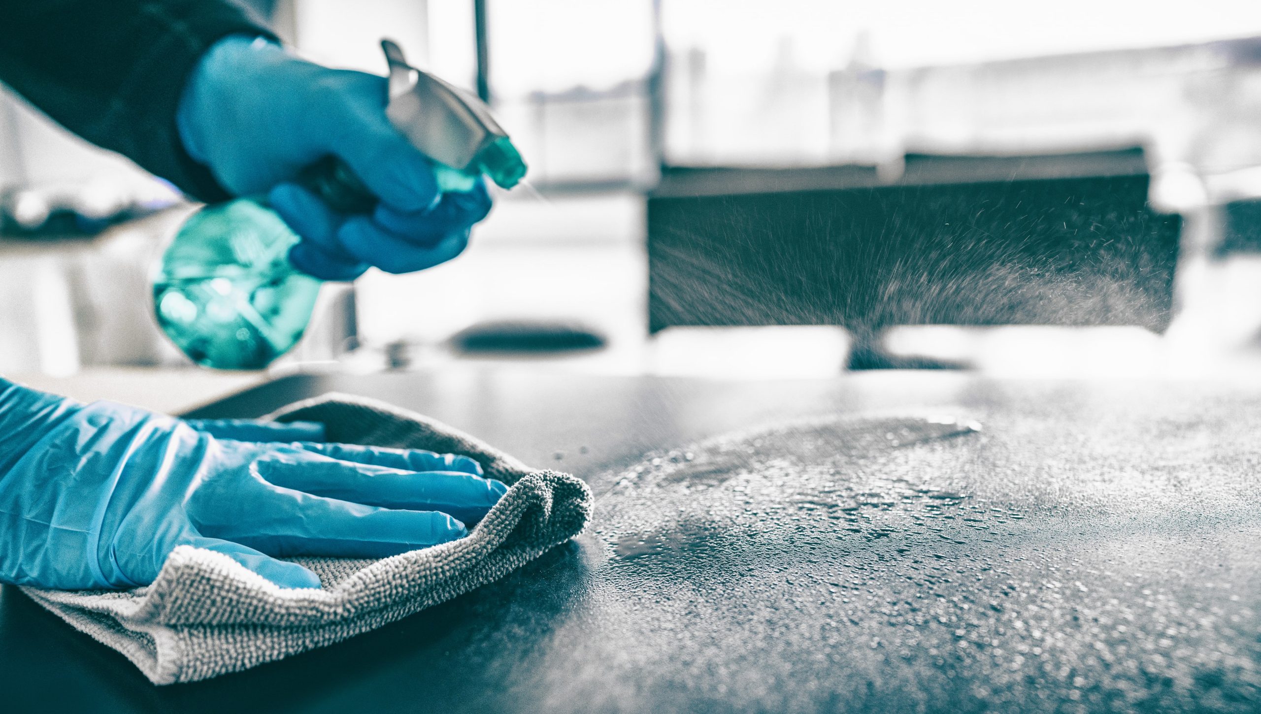 Cleaner spraying solution on surface
