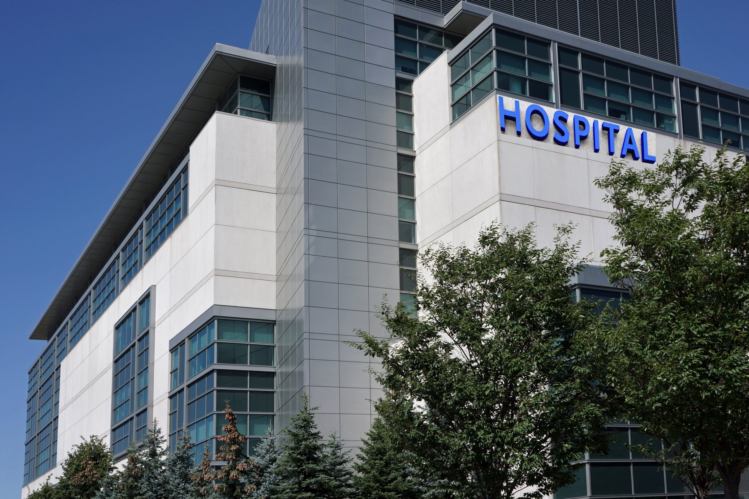 Hospital building with trees in front