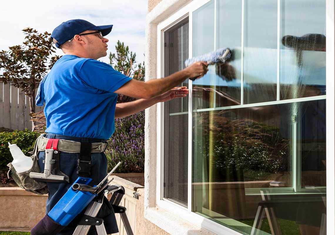 Professional cleaning residential window exterior