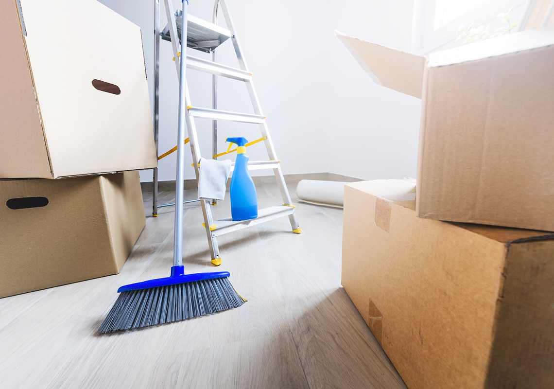 Moving boxes and cleaning supplies